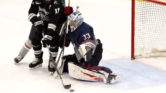 Tomas Vomacka makes a save against Providence on December 28, 2020.