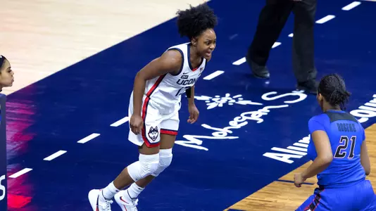 Christyn Williams celebrates after scoring a basket against DePaul on December 29, 2020.