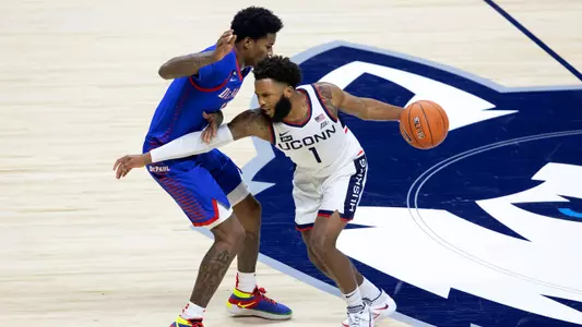 R.J. Cole dribbles across midcourt against DePaul on December 30, 2020.