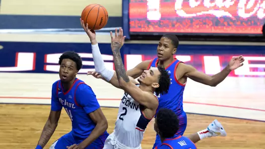 James Bouknight goes to the hoop against DePaul on December 30, 2020.