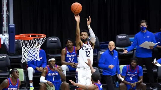 Tyler Polley attempts a three-pointer against DePaul on December 30, 2020.