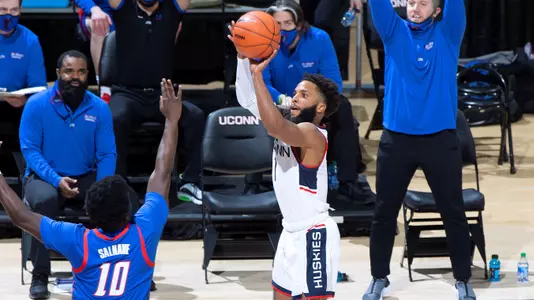 R.J. Cole attempts a three-pointer against DePaul on December 30, 2020.