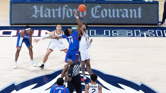 The opening tip of the Huskies' game against DePaul on December 30, 2020.
