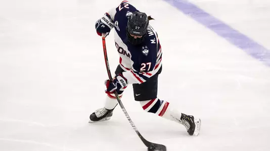 Morgan Wabick takes a slapshot against BC on December 4 in Storrs.