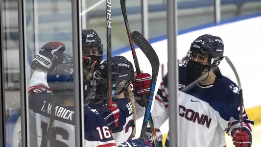 The Huskies celebrate a goal on December 4 vs. BC.
