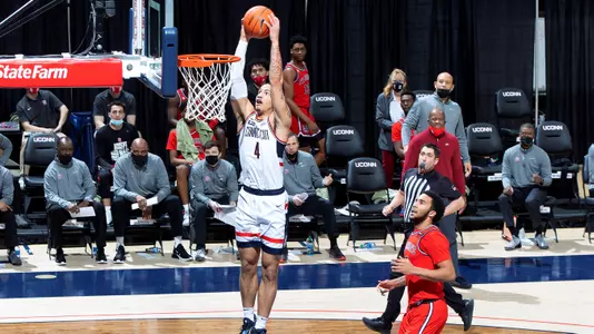 Tyrese Martin dunks it home against St. John's on January 18, 2021.