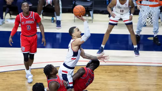 Tyrese Martin drives to the hoop against St. John's on January 18, 2021.