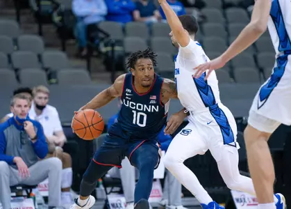Brendan Adams backs down a defender against Creighton on January 23, 2021