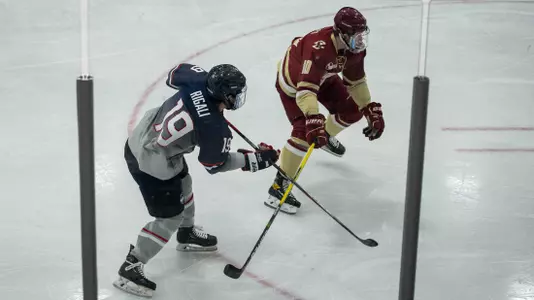 Brian Rigali plays the puck against BC on January 23, 2021.