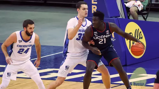 Adama Sanogo dribbles against Creighton on January 23, 2021.