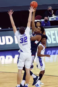 Josh Carlton shoots over a defender against Creighton on January 23, 2021