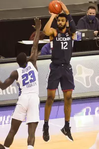 Tyler Polley shoots a three against Creighton on January 23, 2021