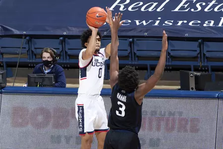 Jalen Gaffney shoots the jump shot in the game against Butler on January 26th at Gampel Pavilion