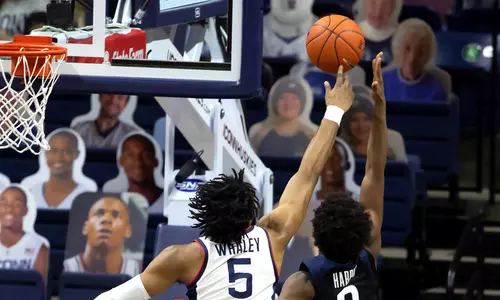 Isaiah Whaley blocks one of his seven shots against Butler on January 26, 2021.