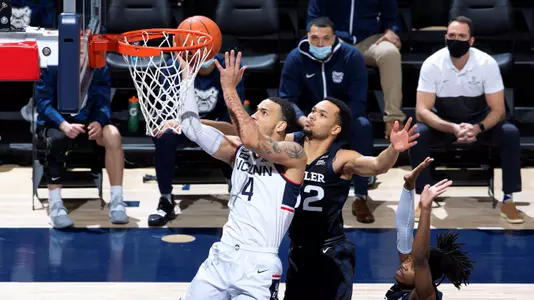 Tyrese Martin drives to the rim against Butler on January 26, 2021.