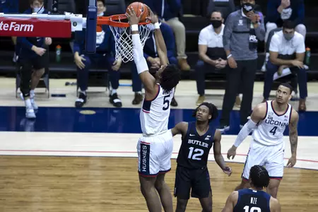 Isaiah Whaley finishes the dunk in the gamea gainst Butler on January 26th at Gampel Pavilion