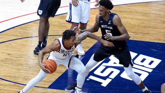 Brendan Adams dribbles against Butler on January 26, 2021.