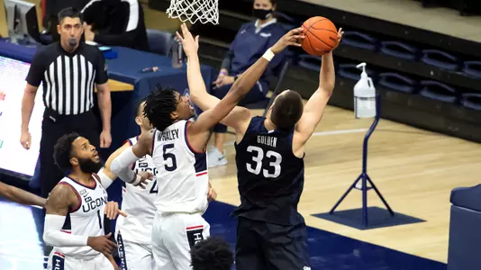 Isaiah Whaley blocks one of his seven shots against Butler on January 26, 2021.