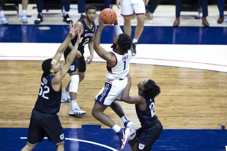 Rj Cole drives the lane and puts up the shot in the game against Butler on January 26th at Gampel Pavilion