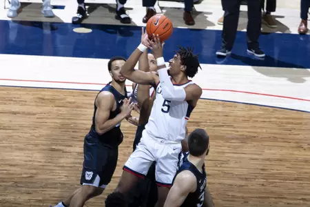 Isaiah Whaley puts up the shot in the lane in the game against Butler on January 26th at Gampel Pavilion
