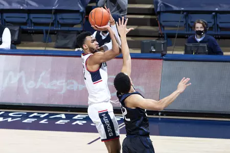 Tyler Polley takes the jump shot in the game against Butler on January 26th at Gampel Pavilion