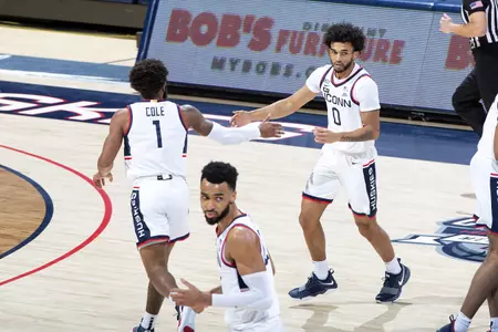 Rj Cole and Jalen Gaffney high five after a bucket in the game against Butler on January 26th at Gampel Pavilion