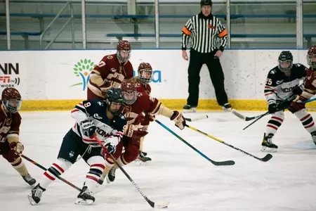 Natalie Snodgrass skates through traffic against BC on January 31, 2021.