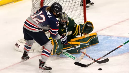 Coryn Tormala takes a shot at close range against Vermont on January 8, 2021.