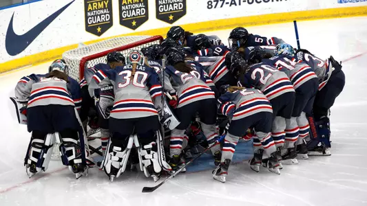 The Huskies prepare to take the ice against Vermont on January 8, 2021.