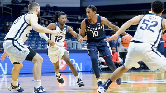 Brendan Adams dribbles against Butler on January 9, 2021.