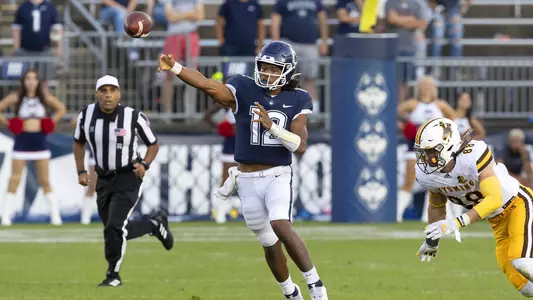 Tyler Phommachanh throws on the run against Wyoming