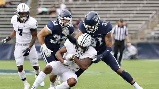 Malik Dixon and Hunter Webb against Yale on October 16, 2021.