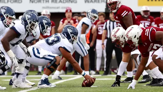 Sidney Walker prepares to snap the ball against UMass
