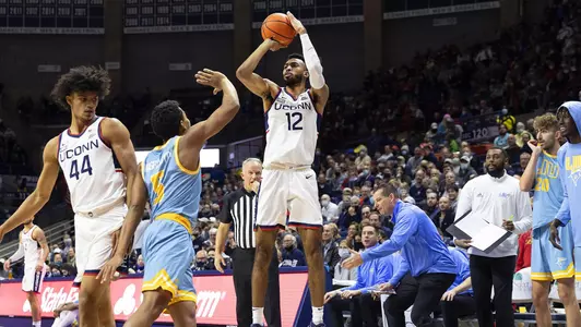 Tyler Polley shoots a three-pointer during the win against LIU on November 17.