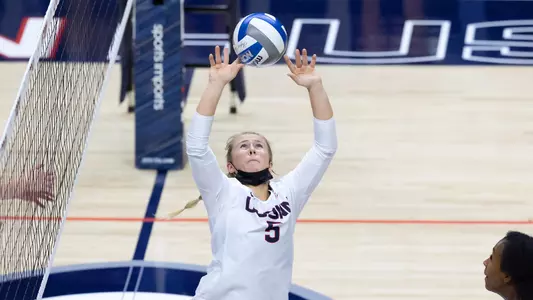 McKayla Wuensch setting the ball