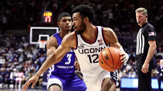 Tyler Polley dribbles against CCSU on November 9, 2021