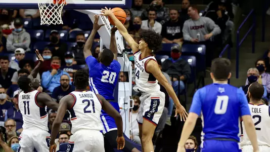 Andre Jackson blocks a shot against CCSU on November 9, 2021