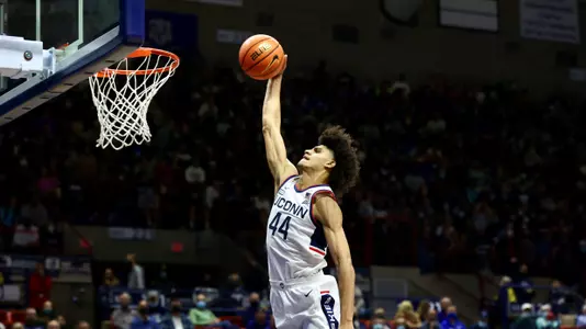Andre Jackson dunks against CCSU on November 9, 2021