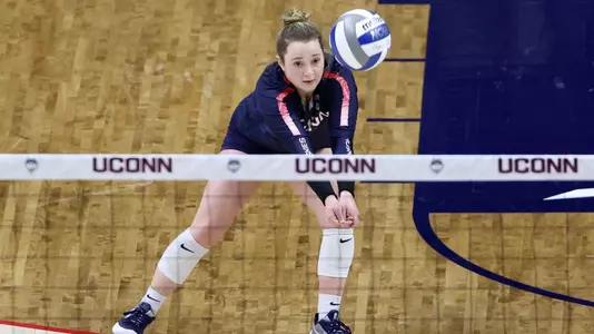 Karly Berkland digging the ball