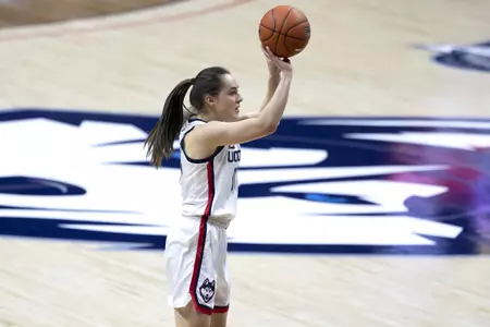 Nika Mühl takes the 3 point shot in the game against Seton hall at gampel pavilion on February 10th