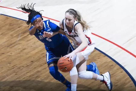 Paige Bueckers drives against the defender in the game against Seton hall at gampel pavilion on February 10th