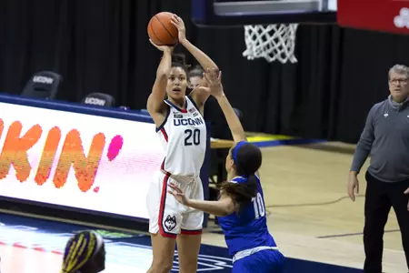 Olivia Nelson-Ododa takes the jump shot over the defender in the game against Seton hall at gampel pavilion on February 10th