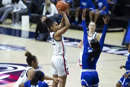 Evina Westbrook takes the jumpshot over the defender in the game against Seton hall at gampel pavilion on February 10th