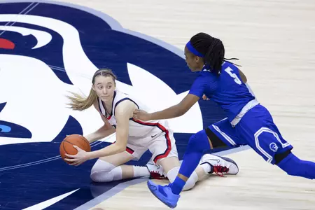 Paige Bueckers dives for the loose ball in the game against Seton hall at gampel pavilion on February 10th