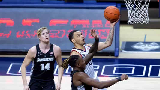 Tyrese Martin makes a move towards the basket against Providence on February 16, 2021.