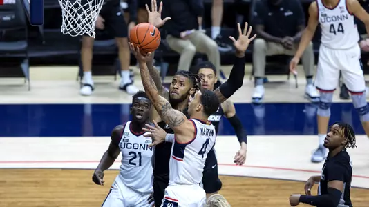 Tyrese Martin drives to the basket against Providence on February 16, 2021.
