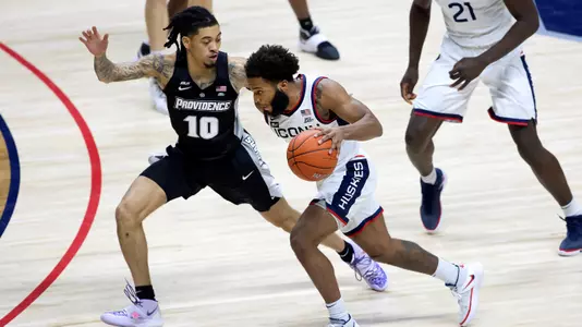 R.J. Cole drives to the basket against Providence on February 16, 2021.