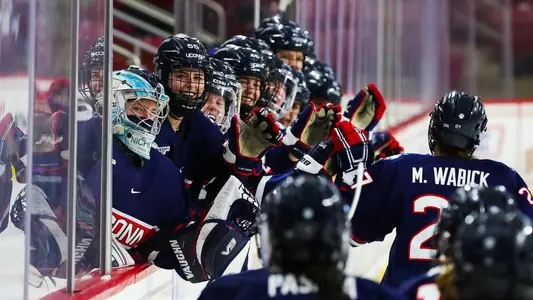 The Huskies celebrate after Morgan Wabick's goal against BC on February 28, 2021.