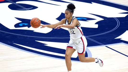 Evina Westbrook passes against St. John's on February 3, 2021.