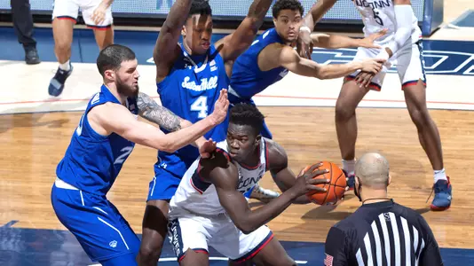 Adama Sanogo draws some attention in the first half of the game against Seton Hall on February 6, 2021.